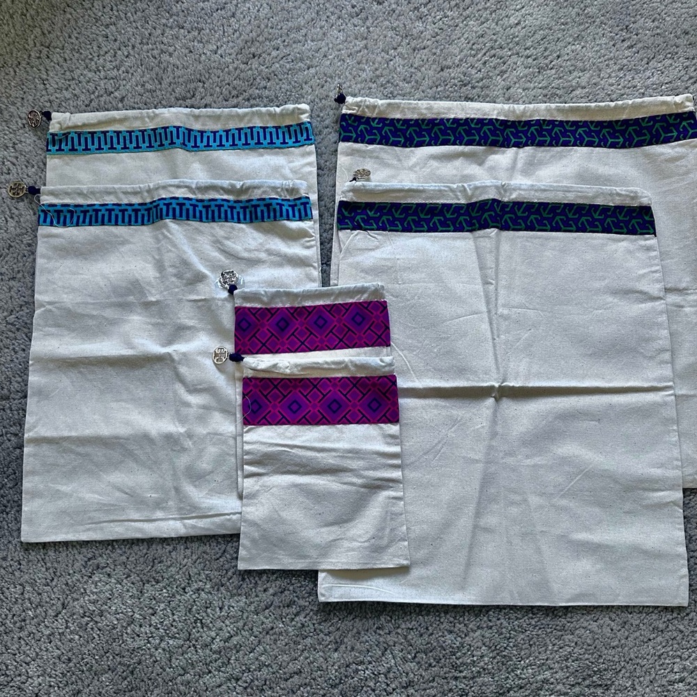 Tori Burch - storage/traveling bags.